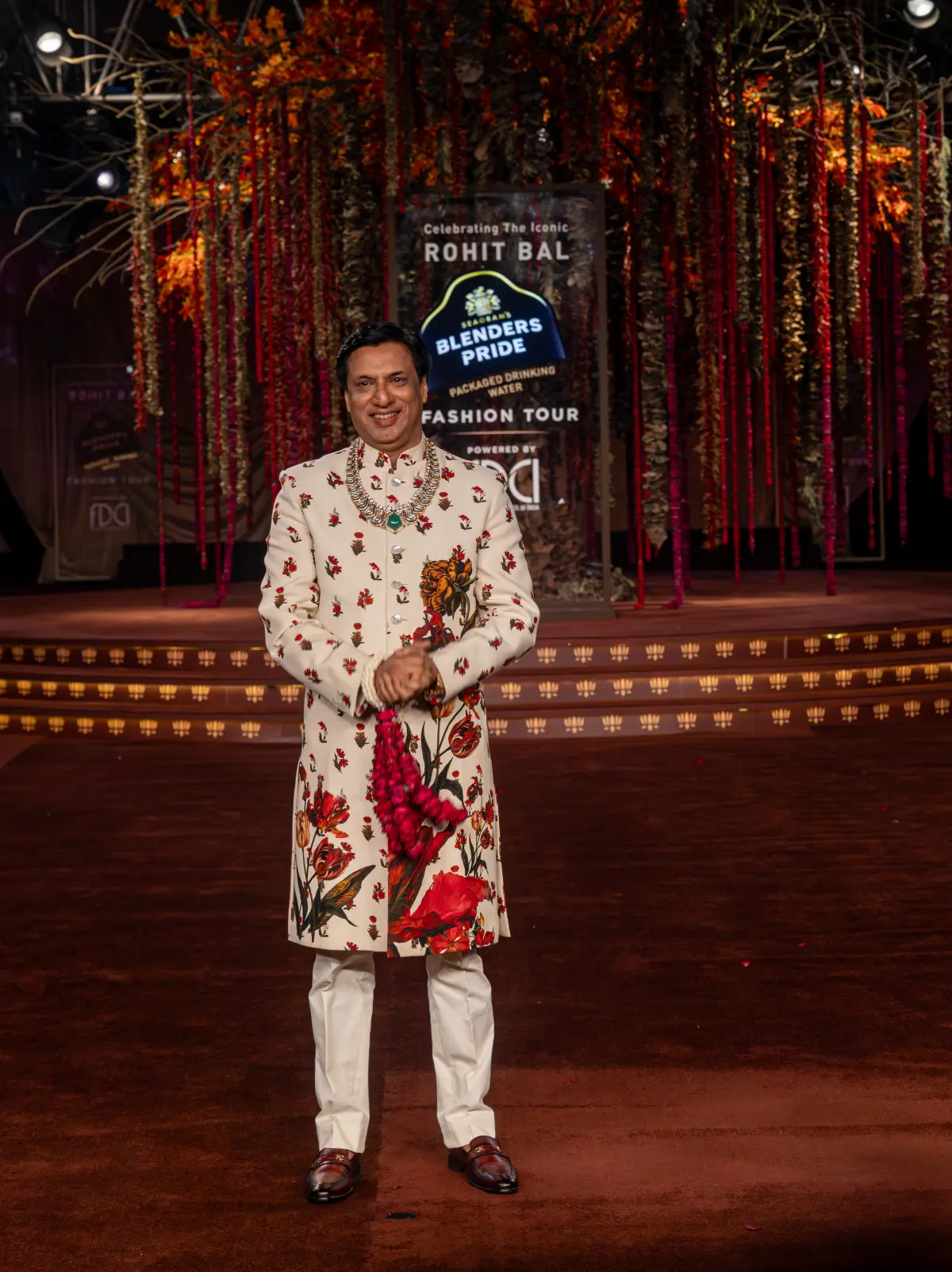 Model walks at the Blenders Pride Fashion runway wearing a cream Banarasi brocade sherwani 