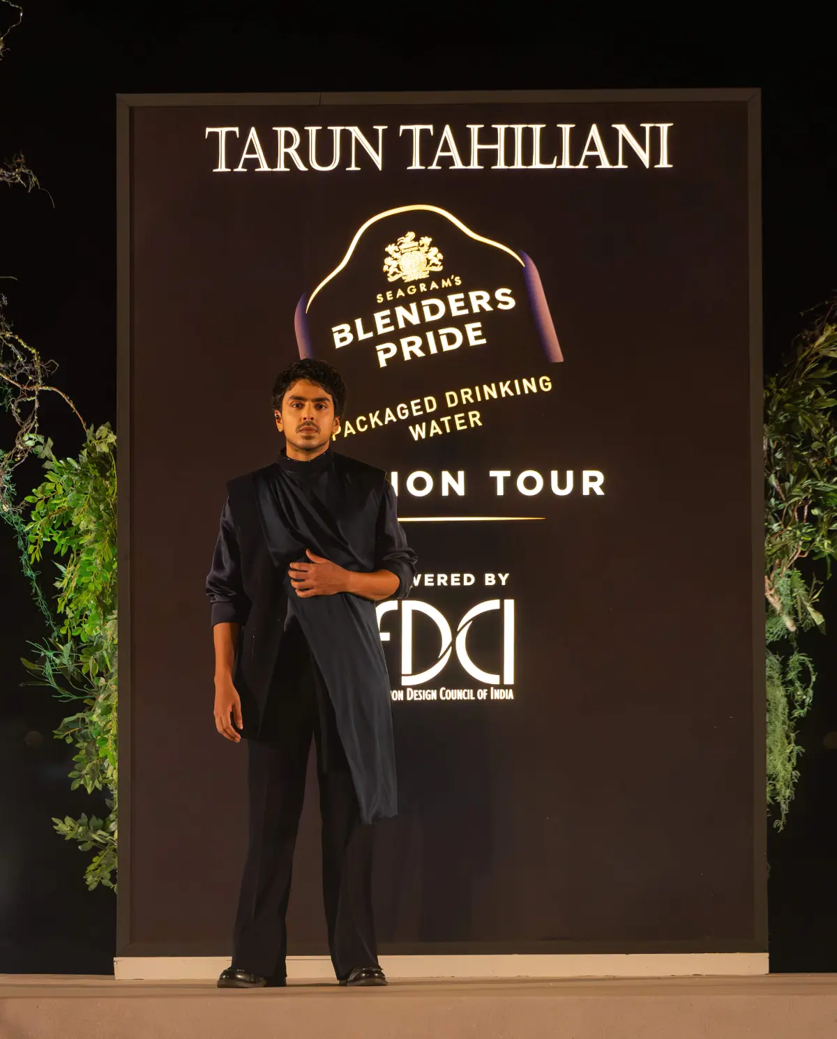 Model in Tarun Tahiliani runway at the Blenders Pride Fashion Tour, wearing a draped navy blue outfit